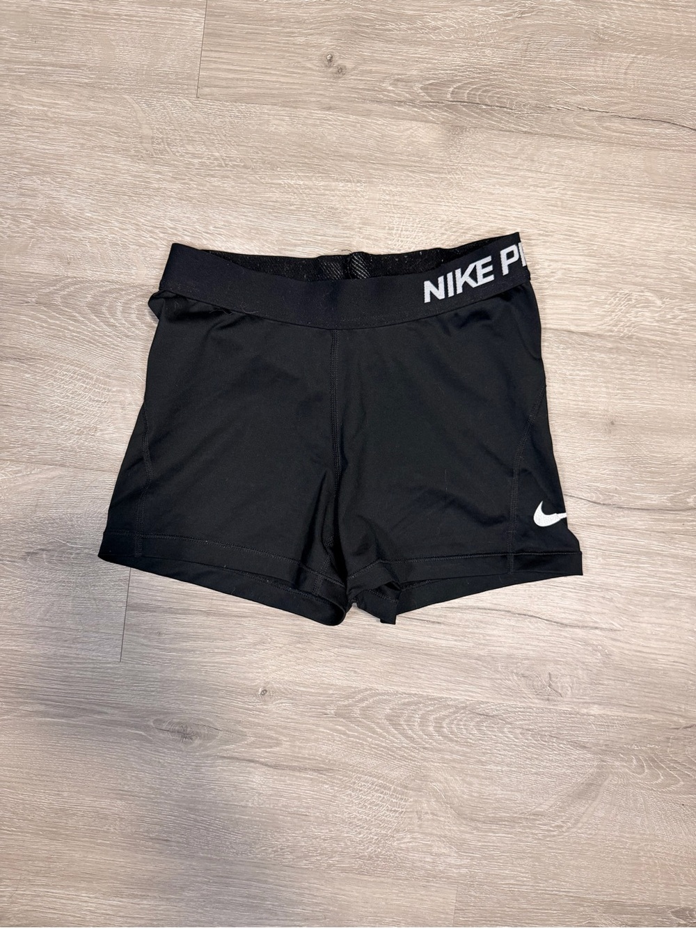 Nike Black Women's Athletic Training Shorts with White Swoosh